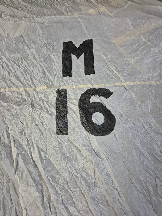 norths sails white asymmetrical spinnaker with black sail number