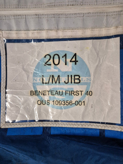 Label on the sail bag with text and logos, including '2014', 'Lite/medium JIB',  'BENETEAU FIRST 40'.