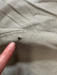 grey sail bag with small hole